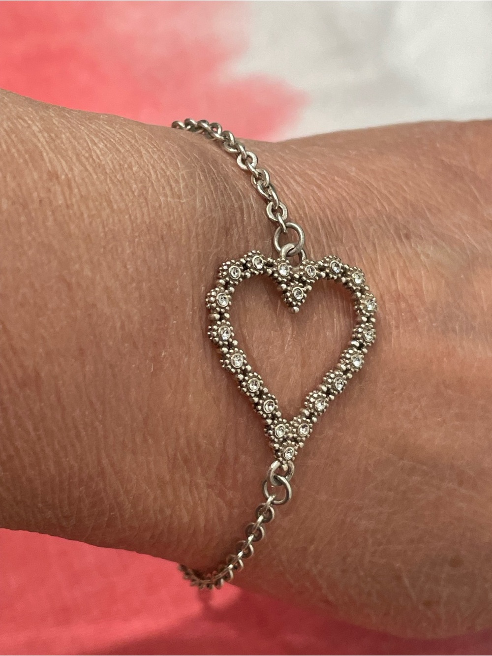 Brighton Elegant Silver Heart Charm Bracelet with Sparkling Floral Accent